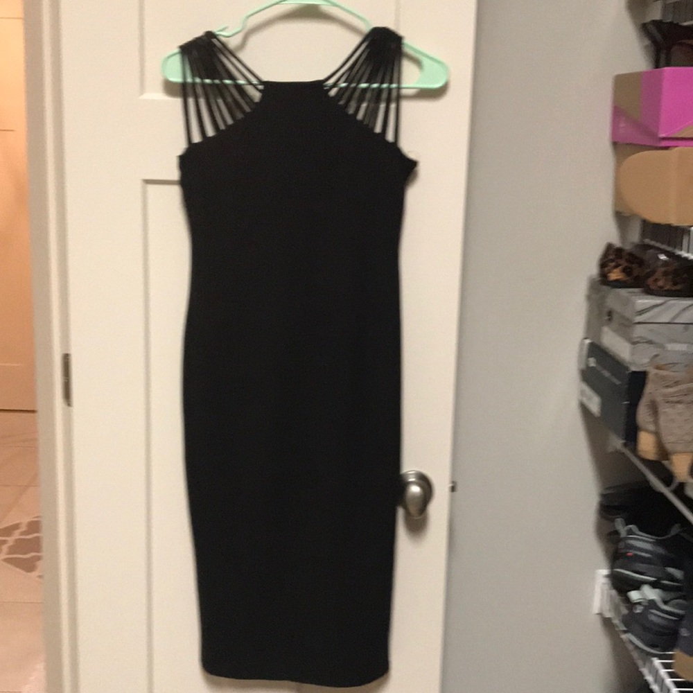 Never worn knit boutique dress. Size M.